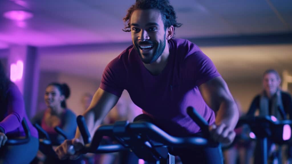 indoor spinning man on bike 1